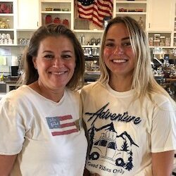 Mary Tuomi and Eva Tuomi, standing at Loco Espress Coffee House & Boutique